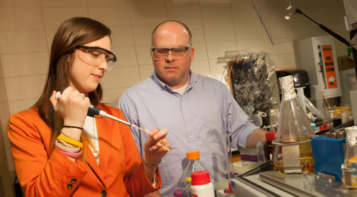 Hands-on learning, mentorships make Mercerians competitive for graduate fellowships Dr. Kirsten (Brown) Cottrill, a 2016 Mercer chemistry graduate and Goldwater Scholar, is shown in a Mercer lab with chemistry professor Dr. Garland Crawford in 2014.