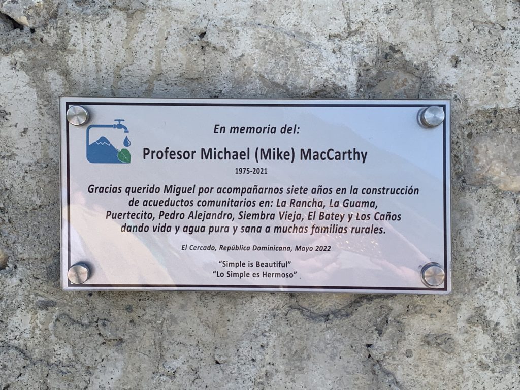 A plaque on one of the water systems in the Dominican Republic pays tribute to Dr. Michael MacCarthy.
