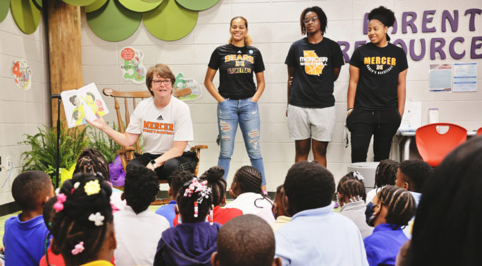 Every Bibb first-grader to get copy of children’s book by Coach Gardner With Mercer women's basketball players by her side, Coach Susie Gardner reads her book to Hartley Elementary students on Aug. 12.