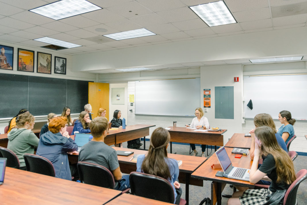Dr. Charlotte Thomas lead students in discussion during her Great Books class on Aug. 25.