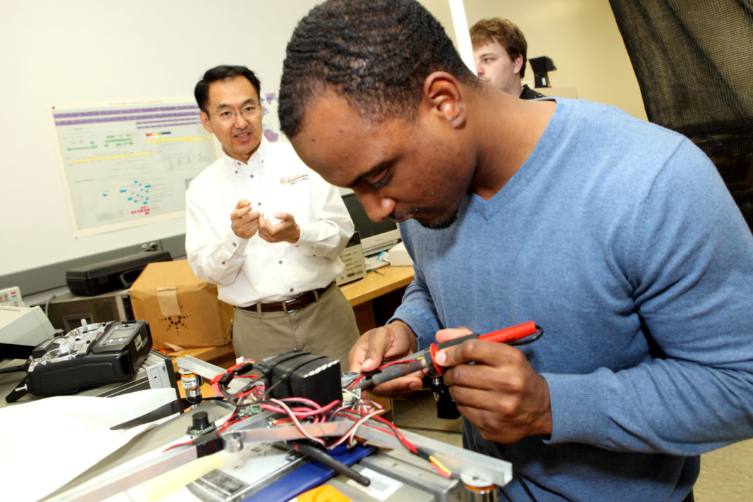 Dr. Choi in robotics lab