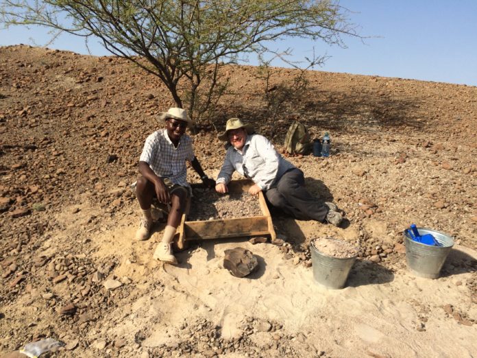 Dr. Francis Kirera (left) and his colleague Dr. Aryeh Grossman, from Midwestern University, are pictured at the Loperot fossil site in Kenya's Rift Valley Province in summer 2016, where they and other researchers discovered a nearly complete skull of a new crocodile species called Kinyang tchernovi.