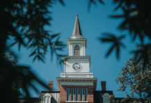Mercer community invited to Service of Blessing for President Elkins A white clock tower with a steeple atop Willingham Hall.