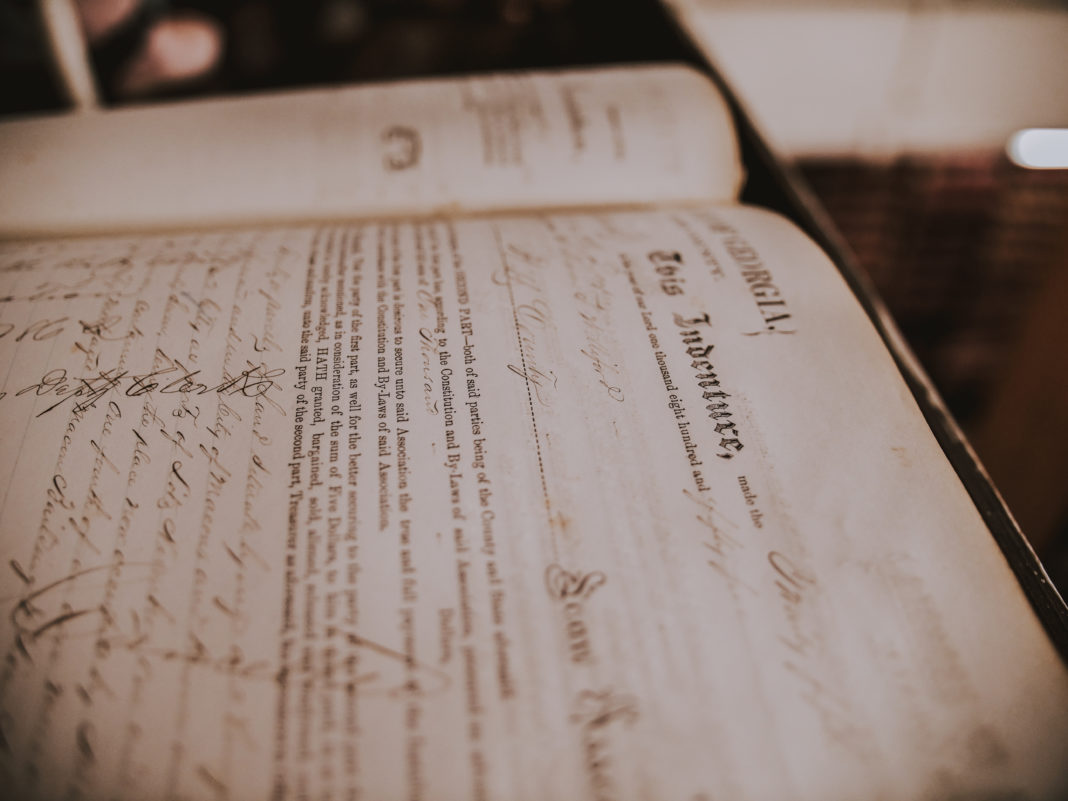 Pages inside one of the Bibb County deed books from the 1800s.