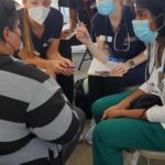PAs, Nurse, Public Health seeing a patient