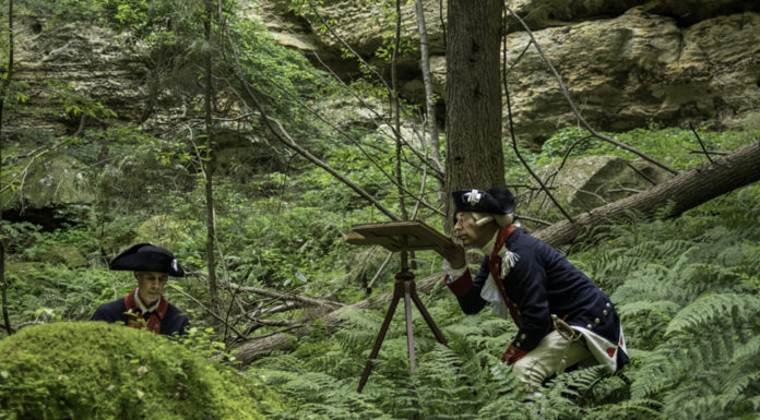 Professor’s groundbreaking book offers living history of Washington’s surveying methods Re-enactors survey in the Ohio wilderness in summer 2019.