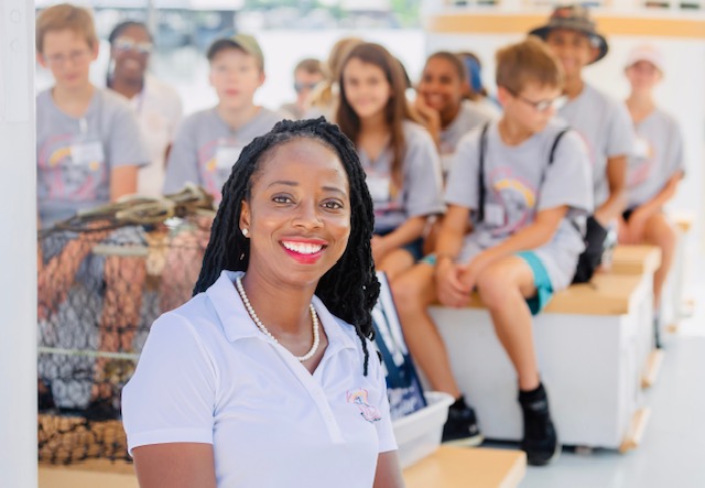 Dr. Crystal Ricks is shown with students at the Calvert Marine Museum for a gifted and talented summer camp.