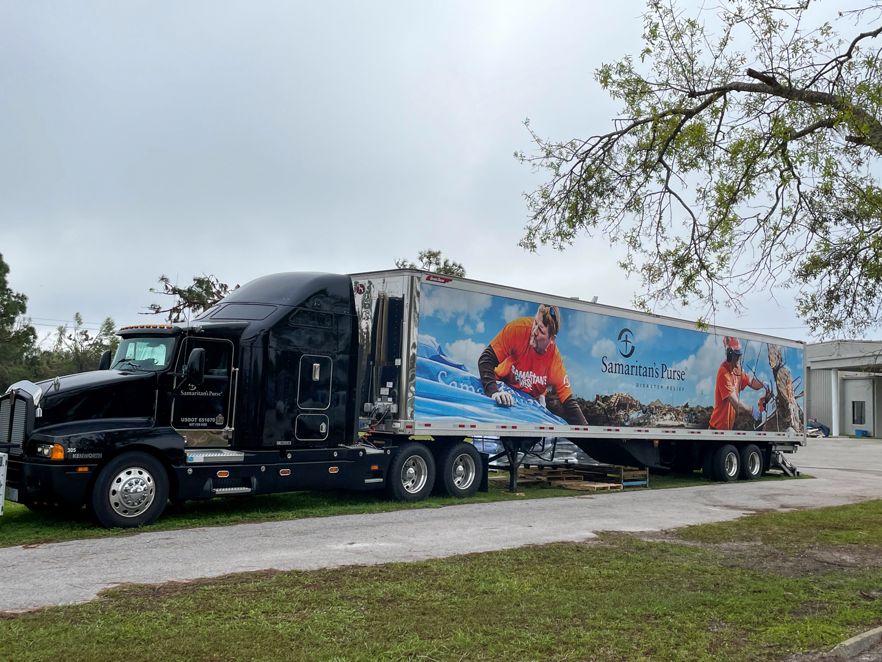 A tractor-trailer truck says the words Samaritan's Purse on the side