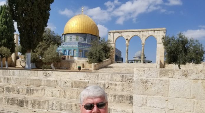 Mercer professor who left Palestine for a better life shares journey in memoir Dr. Hani Khoury in front of the Dome of the Rock in Jerusalem in October 2018.
