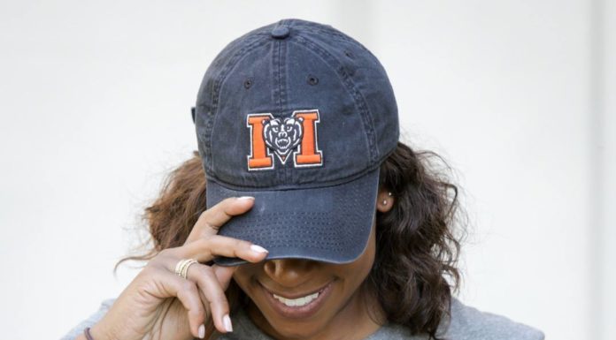 Mercer alumna part of a team that’s making the impossible possible in Macon Erin Keller wears a Mercer hat and a Macon, Georgia, shirt.