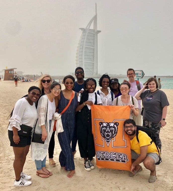 Alumna Hoor Qureshi (third from left) and other Mercerians are pictured during a Mercer-led trip to Dubai.