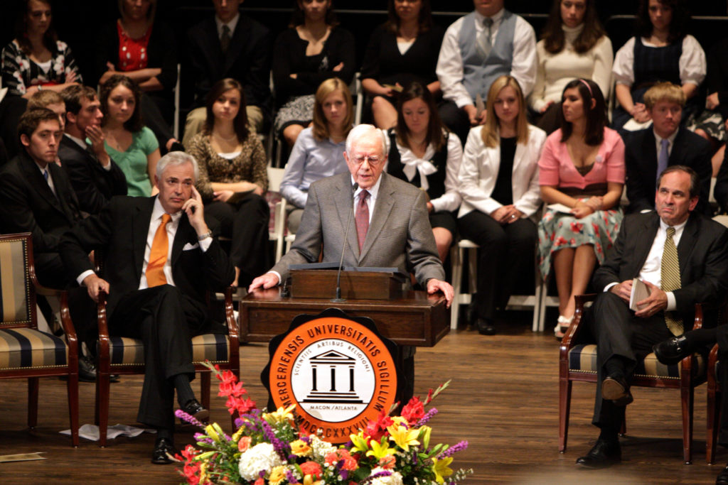 Jimmy Carter speaks at a podium.