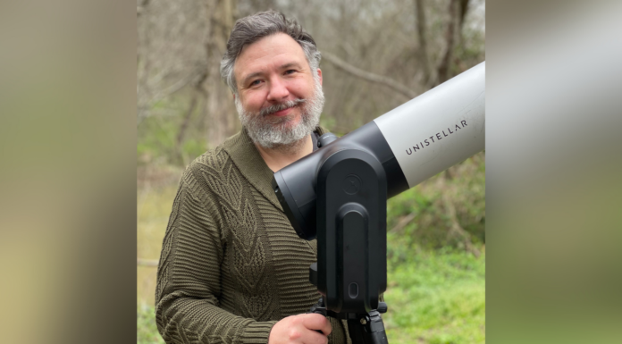 Nursing professor contributes data for first-of-its-kind NASA mission Justus Randolph stands beside his Unistellar telescope.
