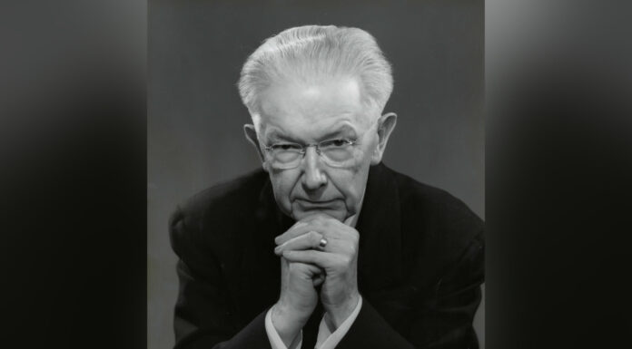 Dr. Spright Dowell credited for University’s financial turnaround | Mercer Legends black and white photo of spright dowell leaning forward with his chin on his hands