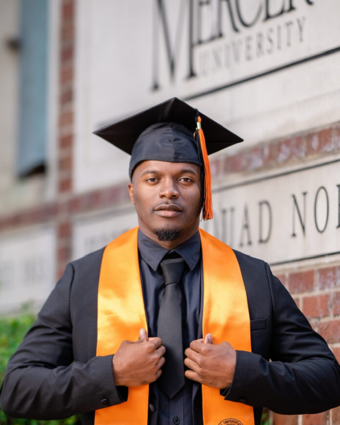 syr'victor rozier in a cap and gown