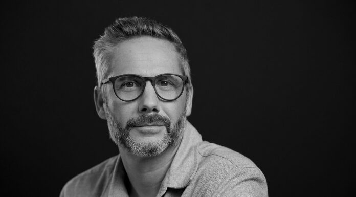 Nursing student wins award for book about Black men who became first U.S. paramedics black and white headshot of kevin hazzard