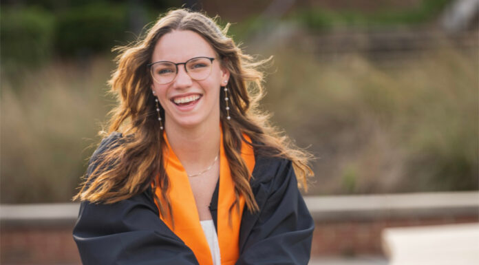 Graduate Spotlight: Lydia Huthmaker Lydia Hutmaker in black graduate gown