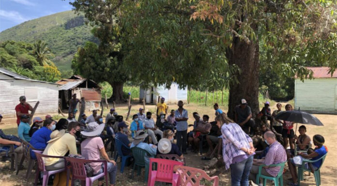 Engineering program continues to focus on water access in Dominican Republic large group gathers under tree