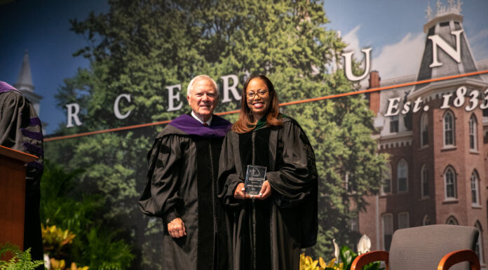 Dr. Keisha Callins named inaugural Sandra Dunagan Deal Rural Service Fellow keisha callins holds her award while standing next to former governor nathan deal