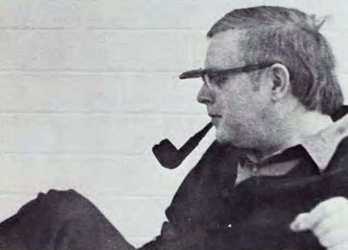 Dr. Ted Nordenhaug smokes a pipe