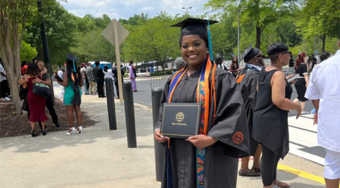 Graduate Spotlight: Chamoya Wong chamoya wong stands with her diploma