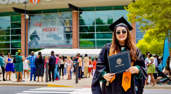 Graduate Spotlight: Safia Jalil Safia Jalil, in graduation cap and gown, holds her diploma