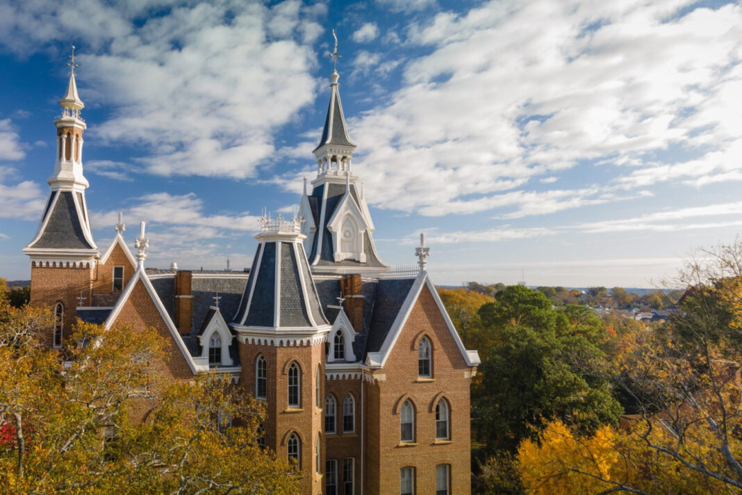 Aerial view of the Mercer Administration Building, a stately brick structure with spires.
