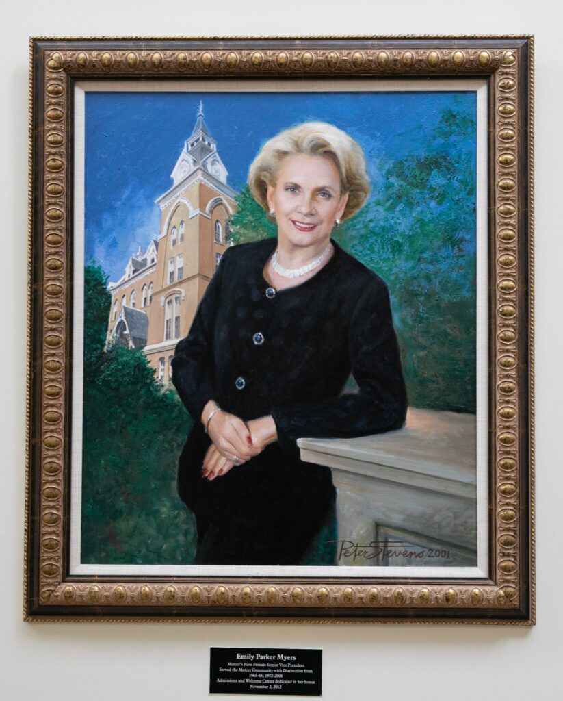 A portrait of a woman with Mercer's administration building in the background.