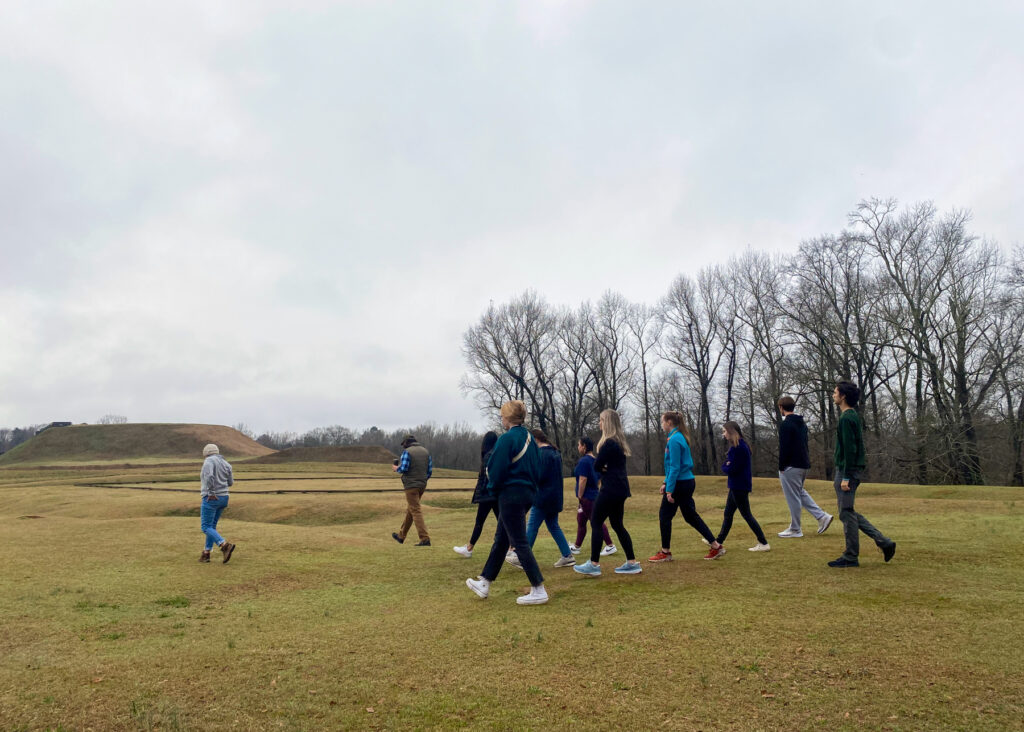 A group walks through the Ocmuglee Mounds