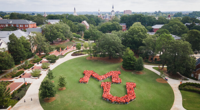 Mercer to welcome Class of 2028 for Move-In Day aerial of students forming the letters MU on field