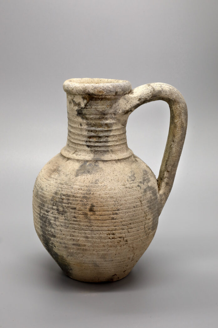 Ancient jug with handle