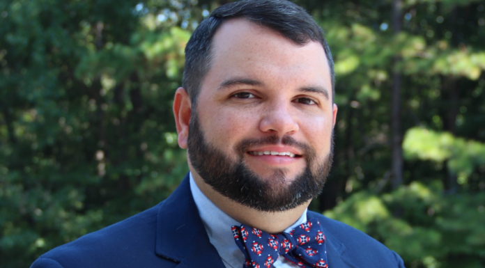 Pharmacy professor, alumnus named Outstanding Faculty Liaison of the Year head shot of Johnathan Hamrick