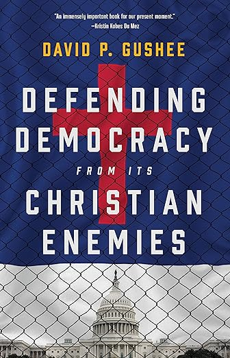 The cover of Dr. Gushee's book shows a red cross behind the title, and the U.S. Capital Building with chain link fence in front.