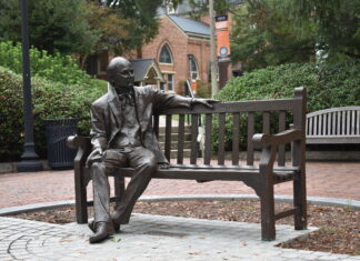 Nine students awarded UN Millennium Fellowships life-size statue of man (Jesse Mercer) sitting on a park bench