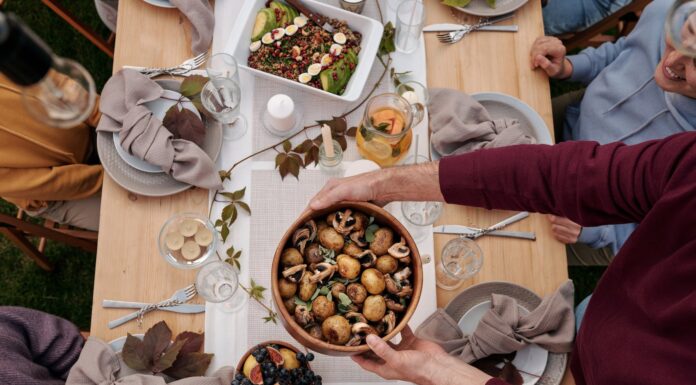 The little gifts in life are more than just ‘stuff’ | Dr. Craig McMahan Person in Maroon Long Sleeve Holding a Wooden Bowl with Food