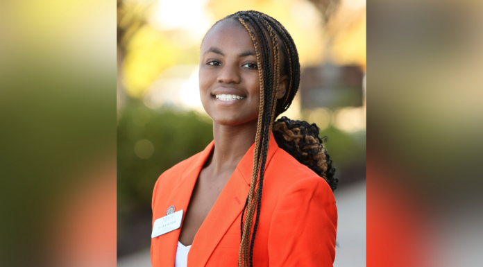 Stamps Scholar wants to use data science to solve social problems A young woman in an orange blazer.
