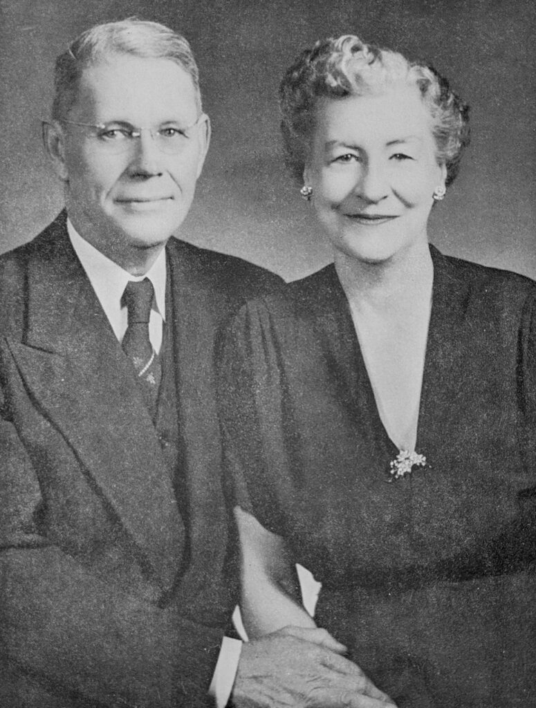 a black and white portrait of a man and a woman