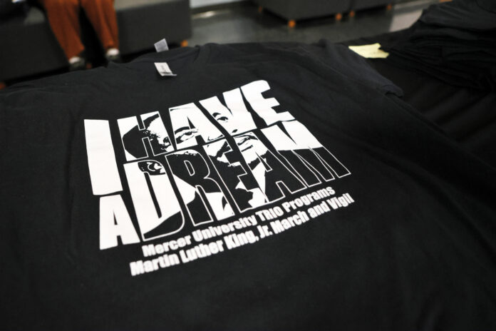 black t-shirt features MLK's image and the words I Have a Dream
