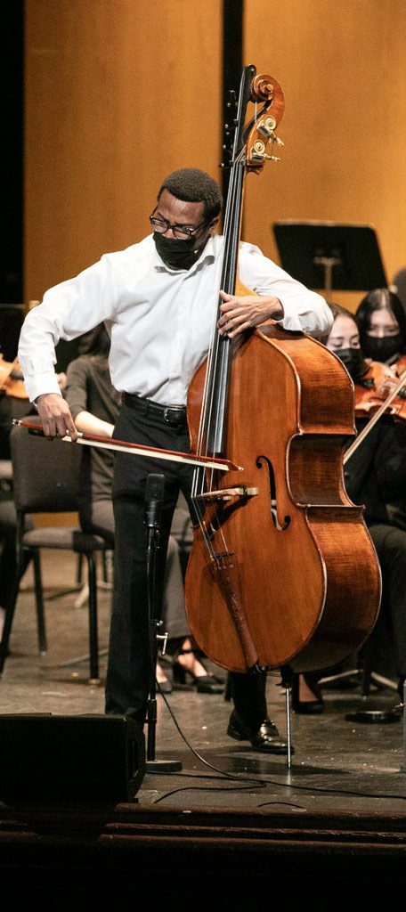 a man plays a cello
