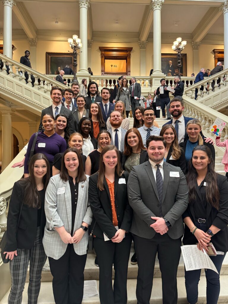 Large group of DPT students standing on Georgia State Capitol steps