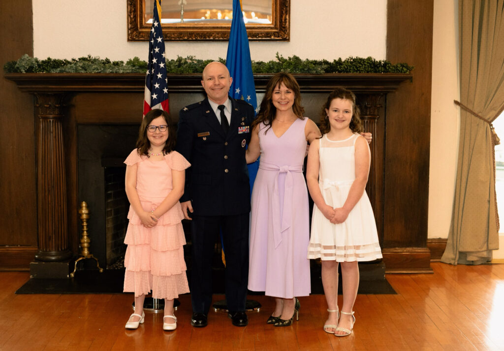 Chris and Christin Rondeau with their two daughters.