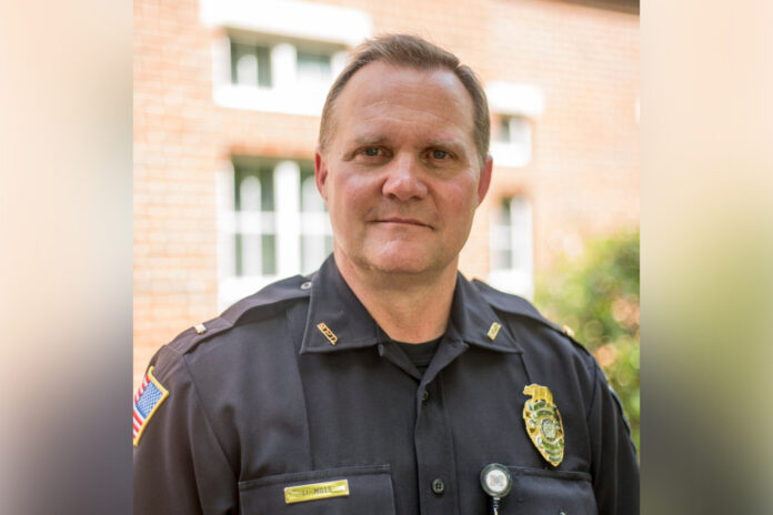 headshot of man in police uniform