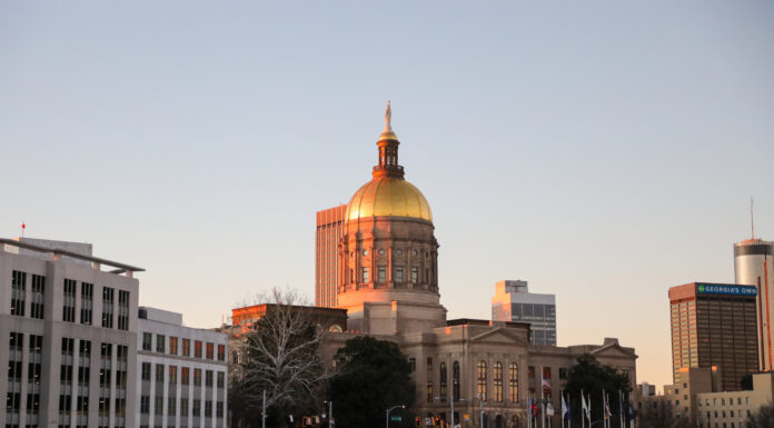 Under the Gold Dome: Mercerians leading in the Legislature a stately building with a gold dome