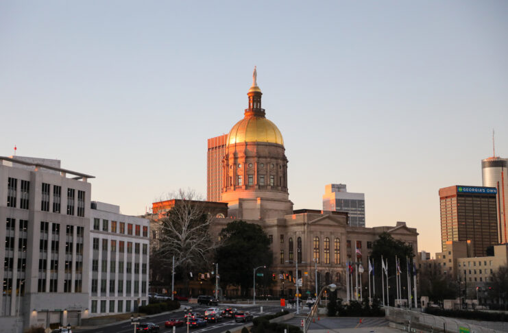 a stately building with a gold dome