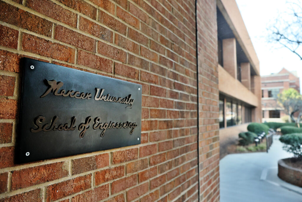 brass School of Engineering plaque on building exterior