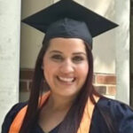 Headshot of Mary Sedyame. She is wearing a black graduation cap and gown and has an orange stole around her neck.