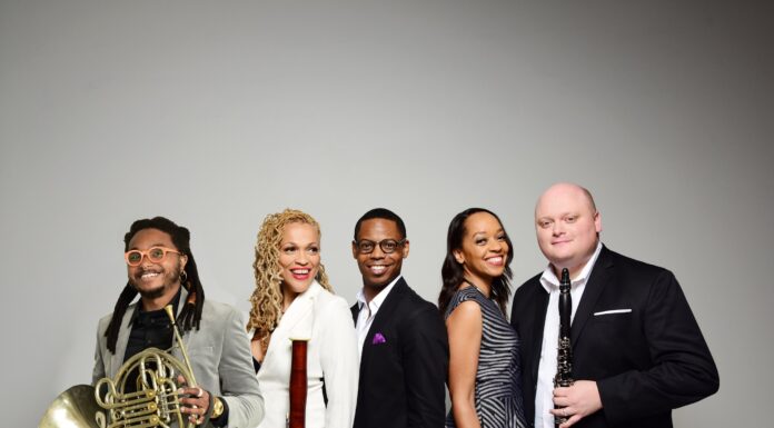 GRAMMY®-winning ensemble Imani Winds opens Jubilee Artists Series season Five musicians pose with wind instruments