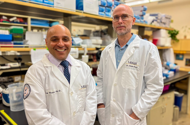 Dr. Nader Moniri and Dr. Clinton Canal from the Mercer College of Pharmacy in a research lab.