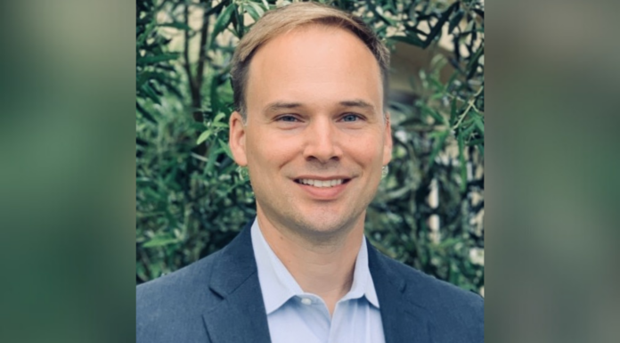 Mercer to host Baptist Joint Committee’s Walter B. and Kay W. Shurden Lectures in Atlanta, Macon A man with light skin, short light brown hair, and blue eyes. He is smiling and wearing a blue collared shirt and a dark blazer.