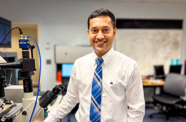 Dr. Raquibul Hasan in the college of pharmacy lab.